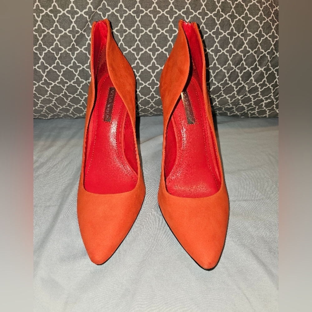 Reddish/orange high heels